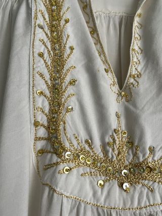 Abito egiziano bianco e oro