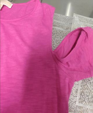 Blusa rosa con ojales