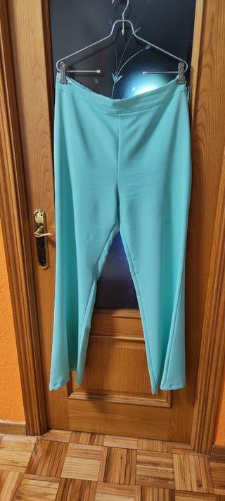 Traje chaqueta aguamarina con plumas T42
