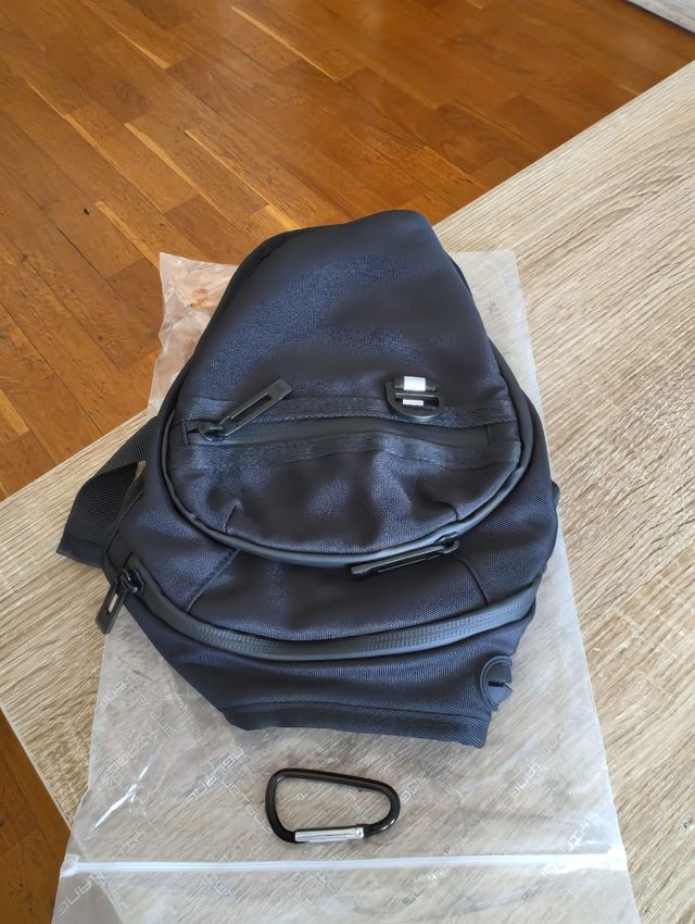 Bolsa pierna moto - bandolera deportiva