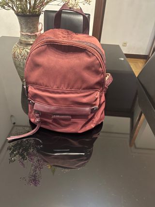 Mochila pequeña marrón-rojiza