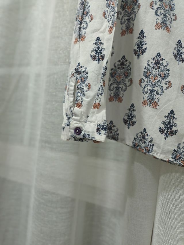 Blusa estampada manga larga