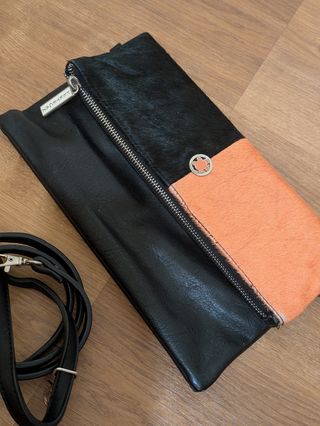 Bolso piel bicolor negro-naranja