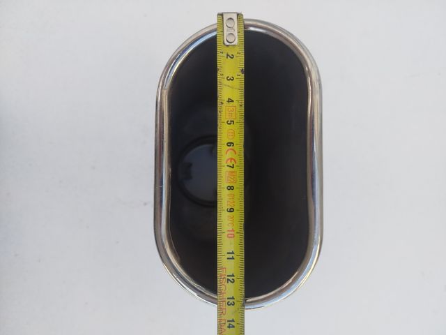 Embellecedor escape coche