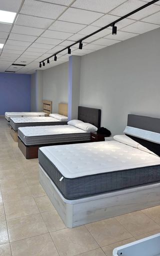 Canapé abatible blanco con colchón