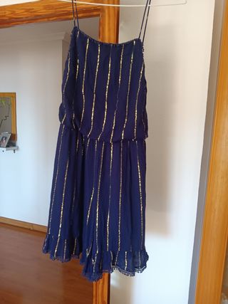 Mono corto azul y dorado