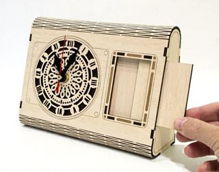 Orologio da tavolo con portafoto