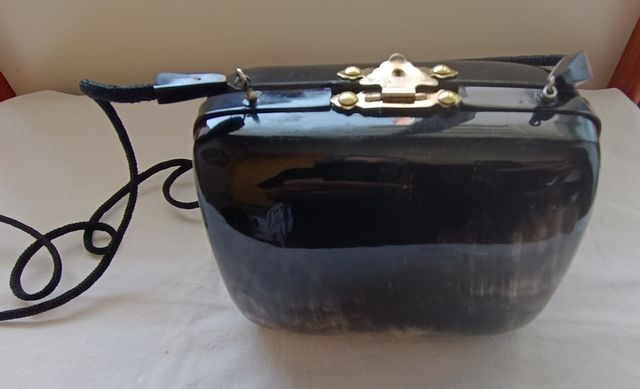 Clutch en cuerno de búfalo