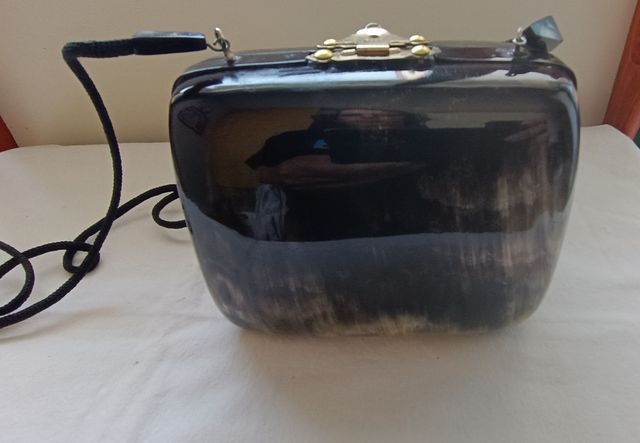 Clutch en cuerno de búfalo