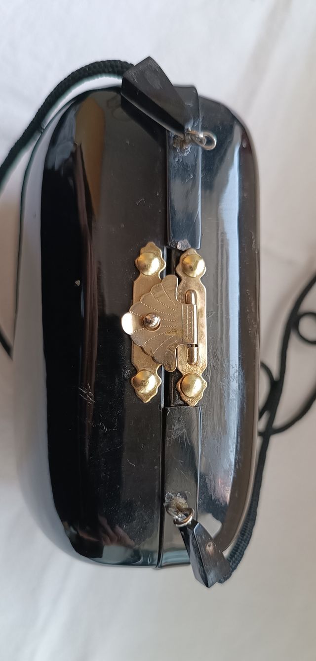 Clutch en cuerno de búfalo