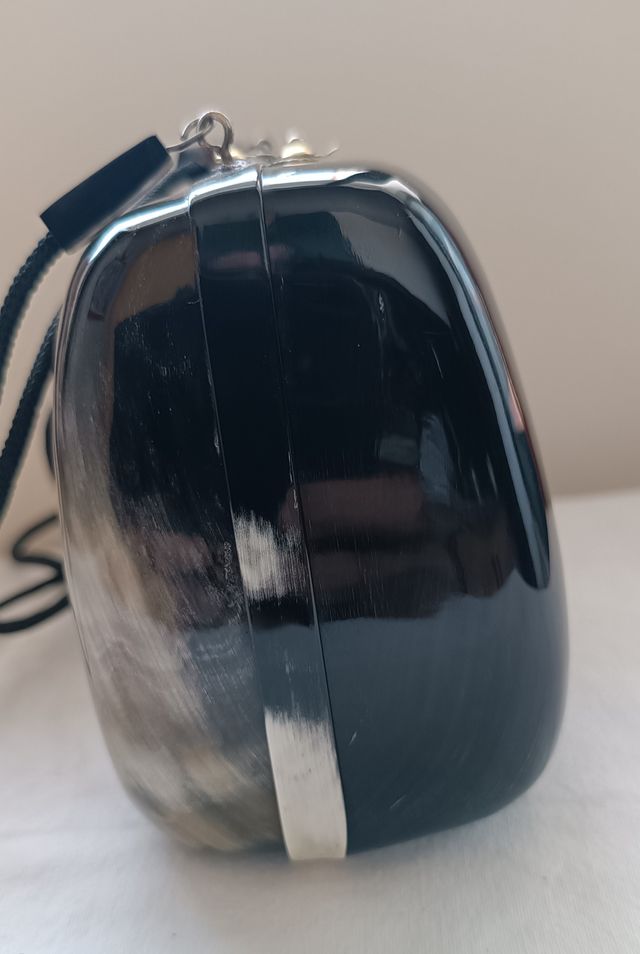 Clutch en cuerno de búfalo