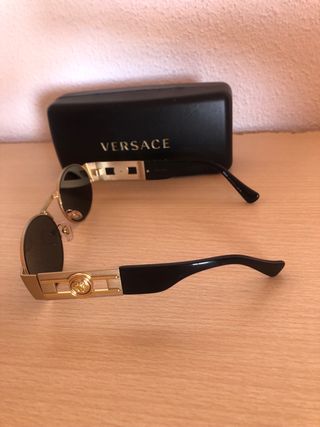 Gafas Versace redondas doradas