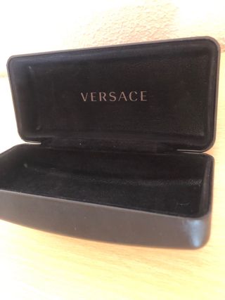 Gafas Versace redondas doradas