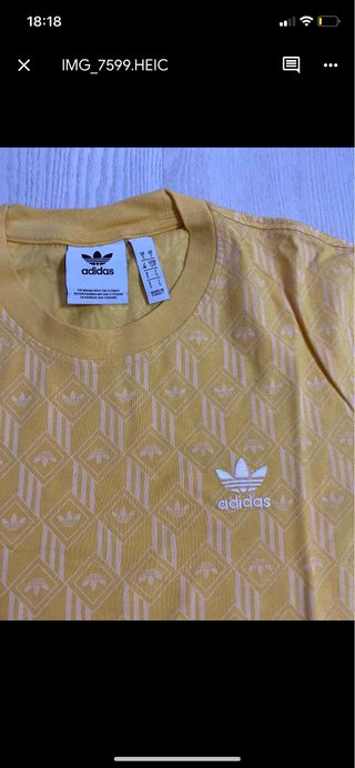 Camiseta de manga corta Adidas amarilla y blanco