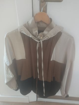 Chaqueta dorado, negro y marrón