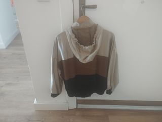 Chaqueta dorado, negro y marrón