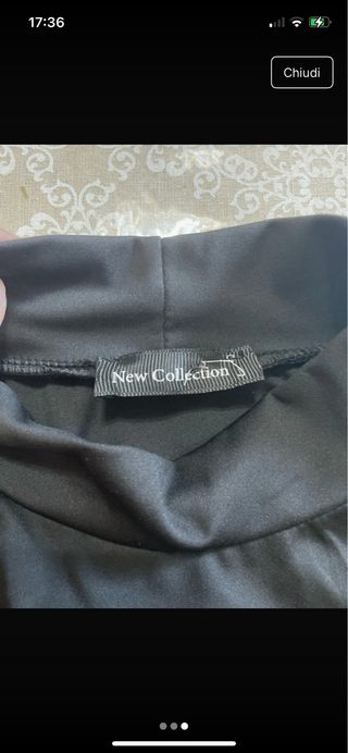 Vestito nero corto scollo alto