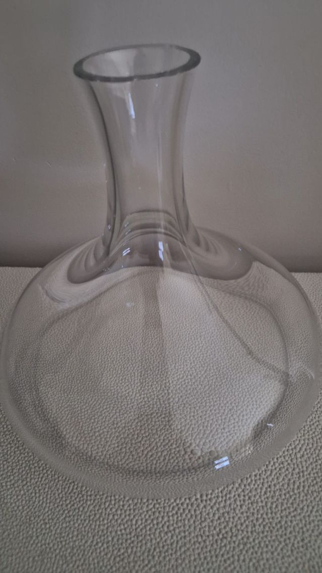 Botella licor cristal circular transparente