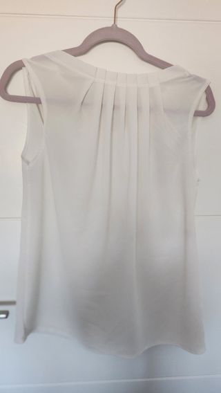Blusa blanca plisada