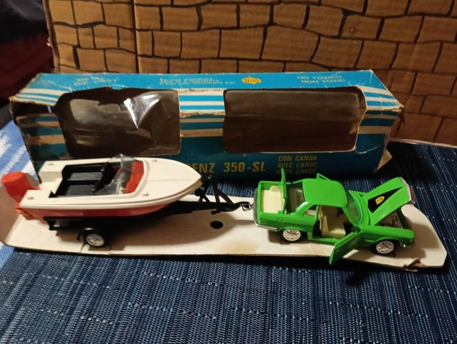 Joal .Mercedes Benz 350 SL + Barca. joal a Vio