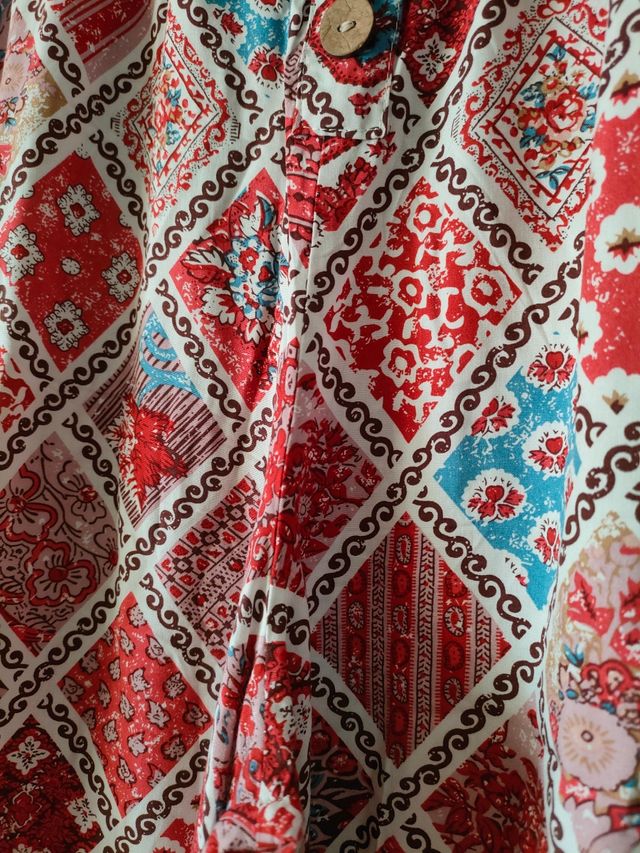 Pantalones campana rojos estampados