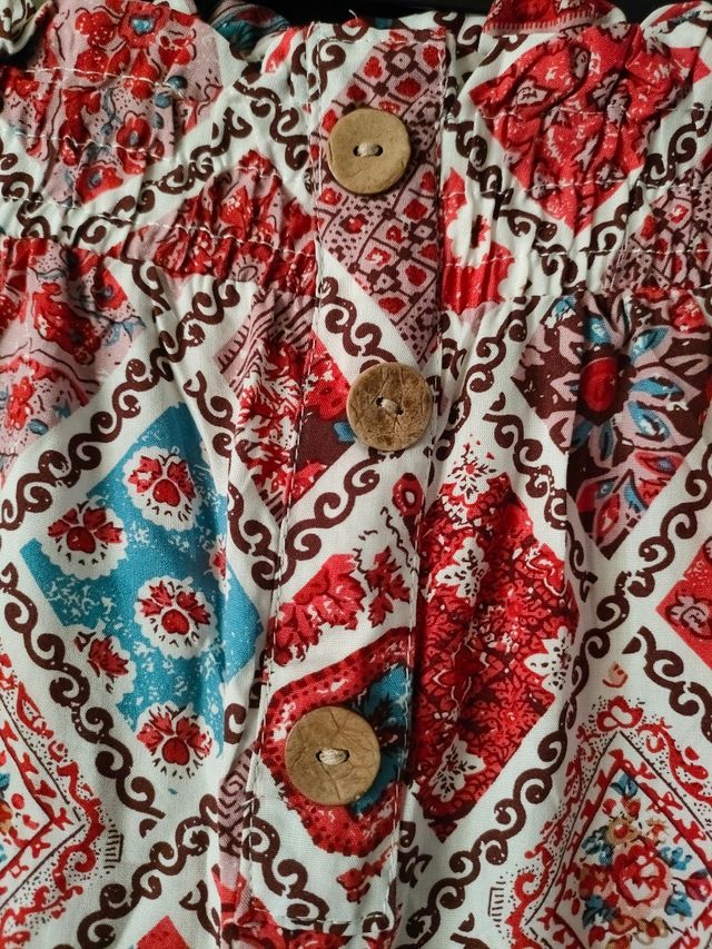 Pantalones campana rojos estampados