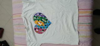 Maglie donna: nere, blu e bianca.