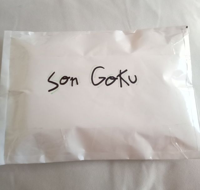 Squishy Son Goku + tarjeta Dragon Ball