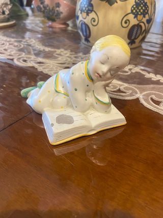 Angioletto lenci che legge da restaurare 