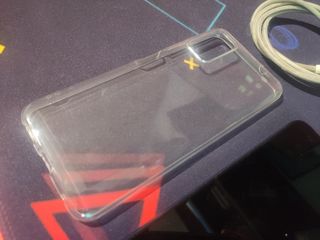 Móvil ZTE A7030 + funda transparente + cargador
