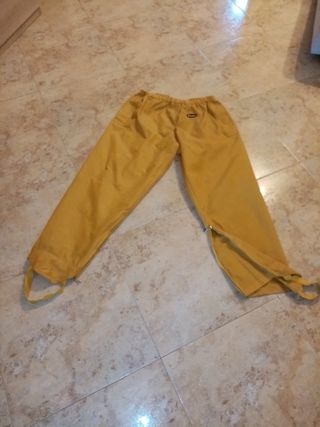 Pantaloni antipioggia gialli taglia M


