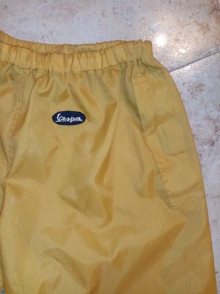 Pantaloni antipioggia gialli taglia M


