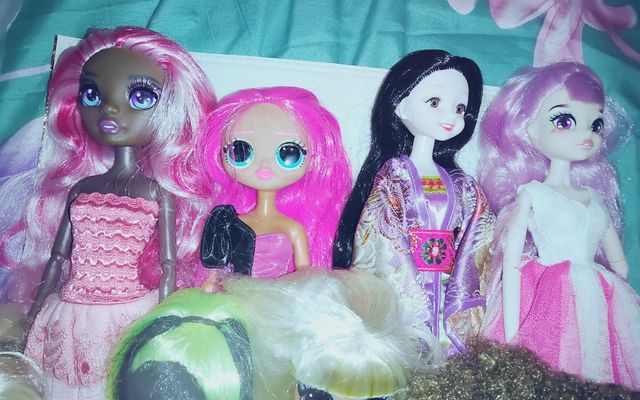 8 Bambole Giocattolo