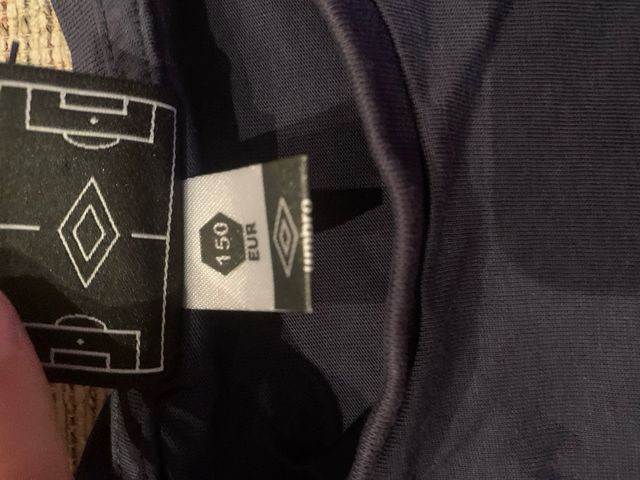 Pack de dos camisetas niño UMBRO y QUICKSILVER