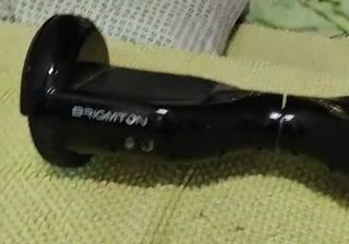 Patin eléctrico . 
Hoverboard negro. 
Patinete 