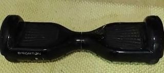 Patin eléctrico . 
Hoverboard negro. 
Patinete 