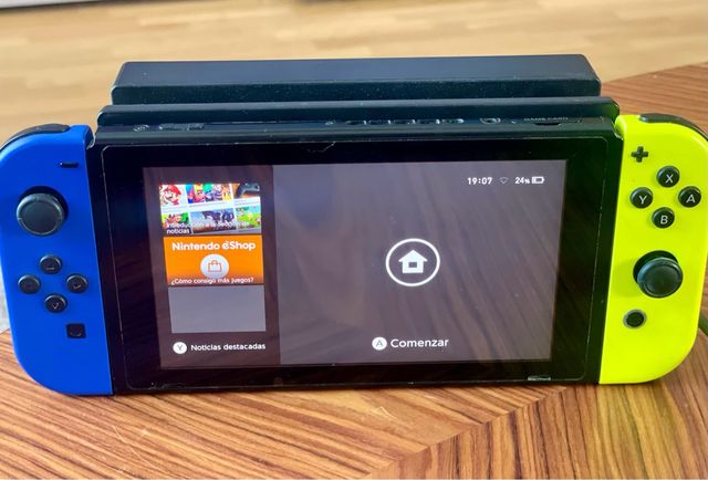 Nintendo Switch con accesorios y juegos de regalo.