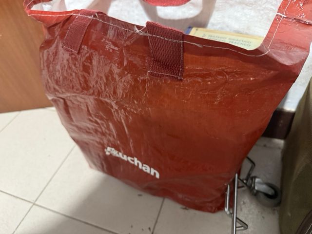 2 bolsas de libros y novelas