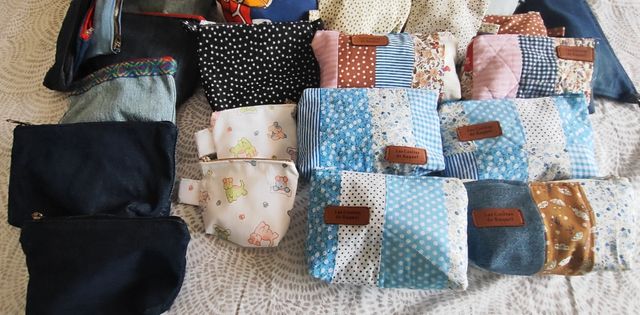 Neceseres /monederos artesanales multicolor. Vario