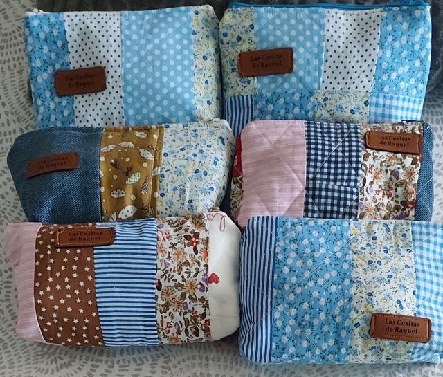 Neceseres /monederos artesanales multicolor. Vario