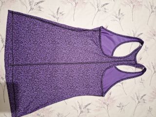 Camiseta Nike Dri-Fit morada deportiva