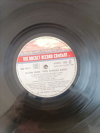 Vinilo Elton John - Reg Strikes Back