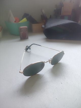 Ray Ban redondas, doradas