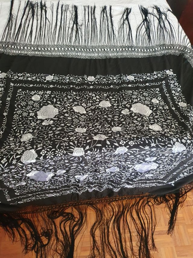 Manton Manila grande.