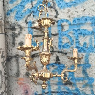 Lampadario antico in metallo dorato