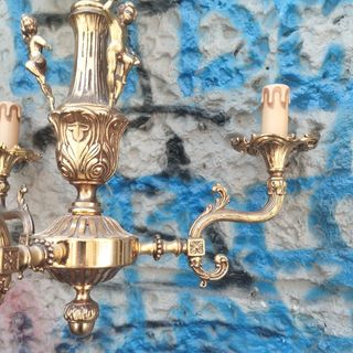 Lampadario antico in metallo dorato