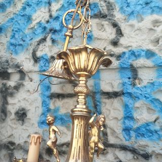 Lampadario antico in metallo dorato