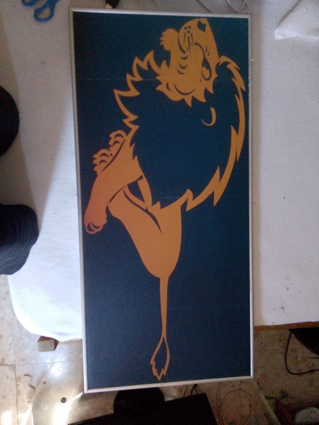 Cuadro león enmarcado dorado