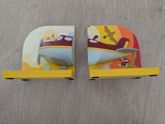 Sujeta libros avión infantil