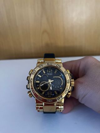 Reloj SMAEL dorado
